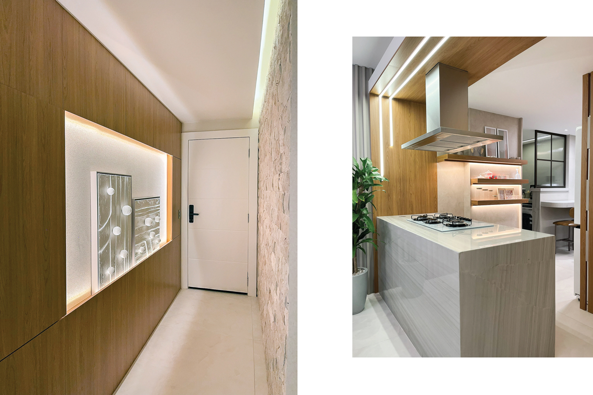 Hall com iluminação indireta destacando as texturas e os quadros.A iluminação direta em perfil de led marca a área de uso na ilha para cozinhar. A iluminação indireta nas prateleiras destaca a decoração e traz efeito difuso de aconchego ao ambiente. (Fotos Alle Tavares) 